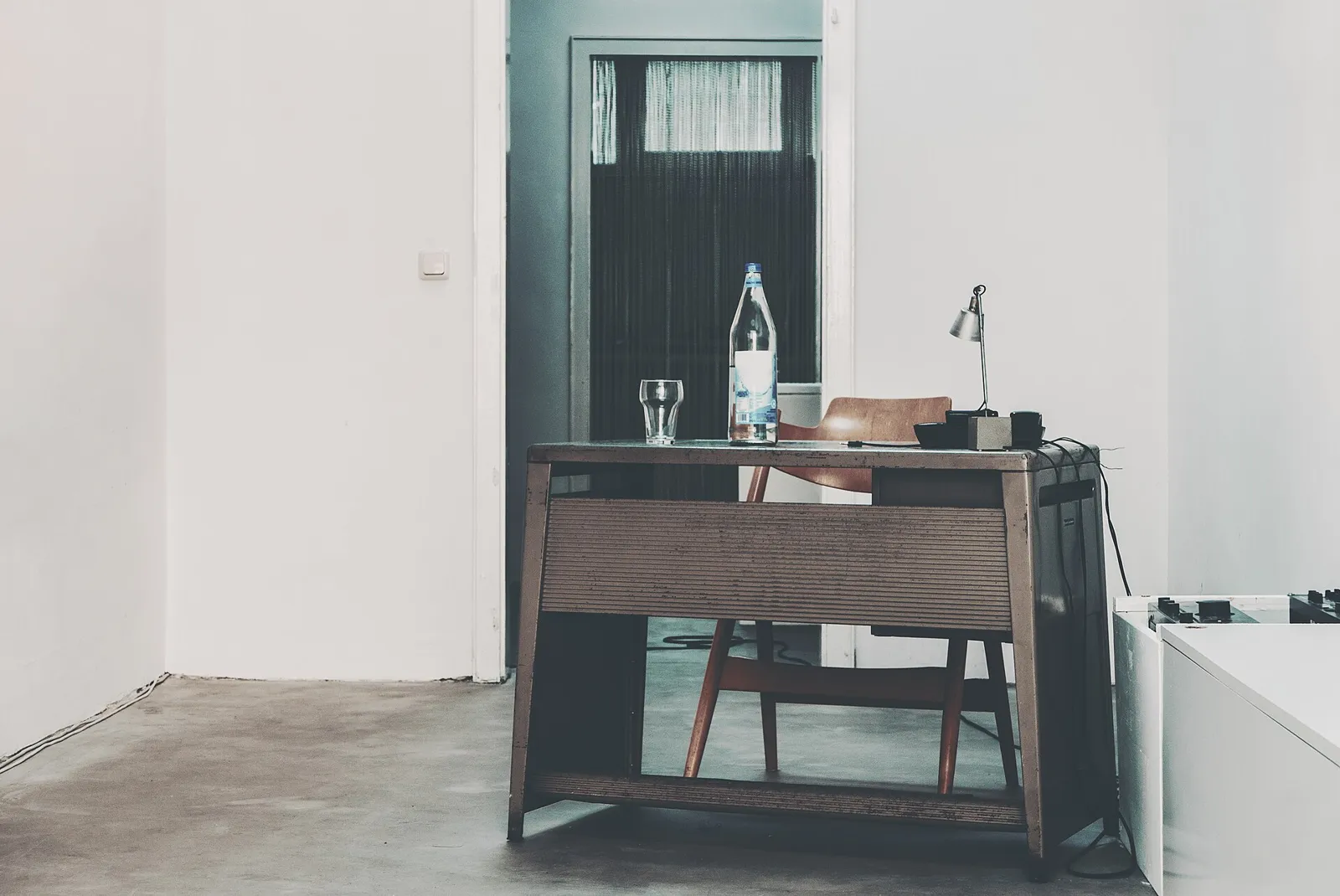 A quiet, minimalist office desk used for company tax and VAT administration
