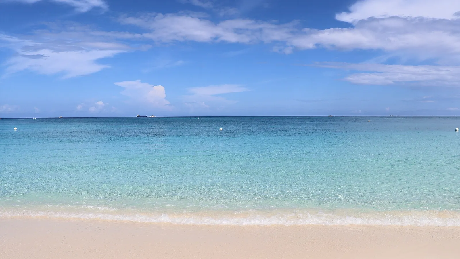 White sand and calm sea along Seven Mile Beach, Grand Cayman